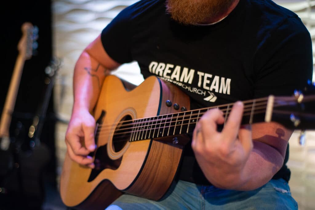 Kyle on guitar closeup